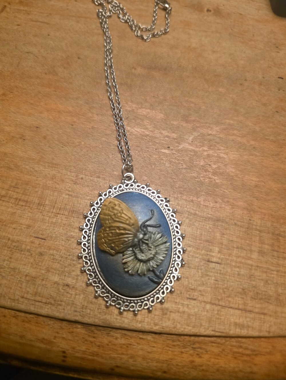 Orange Butterfly On A Sunflower Pendant On A Silver Tone Chain Necklace